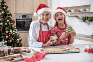 Woman with beautiful smile around the holidays after getting dental implants in Rancho Mirage, CA